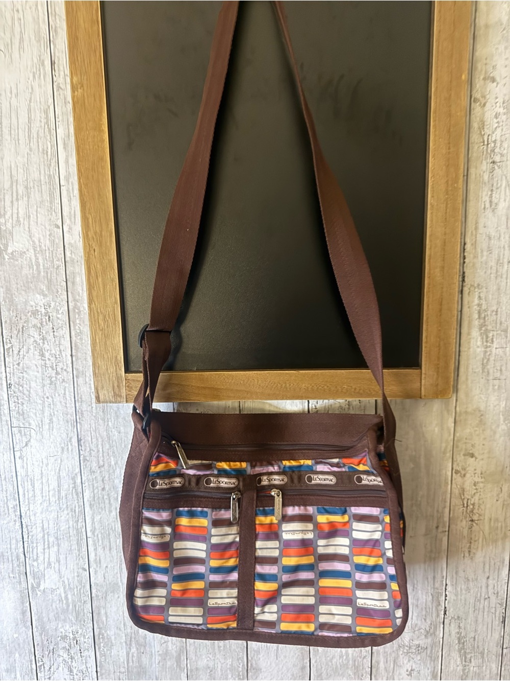 LeSportsac Deluxe Everyday Crossbody Bag Multi Geometric Brown Trim Expandable